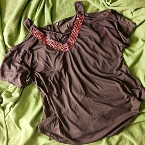 V-neck peekaboo shoulder blouse.